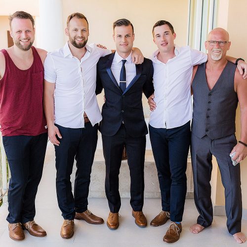 Portrait of groom with friends before wedding at NOW Jade Riviera Cancun