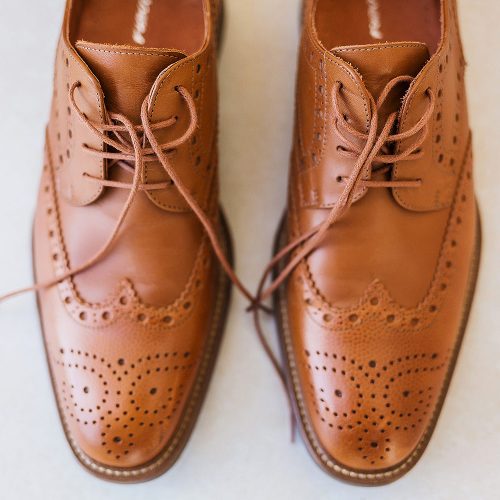 Close up of grooms shoes