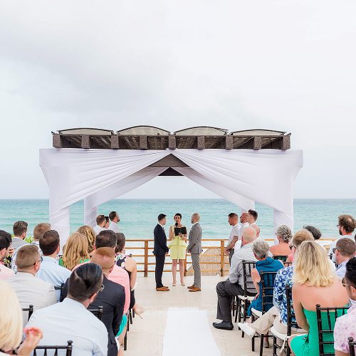 Gay wedding under pergola at NOW Jade Riviera Cancun