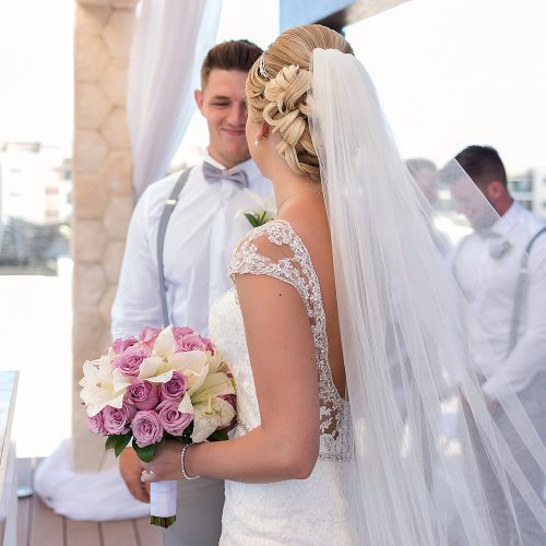 Bride and groom meeting on sky deck wedding ceremony