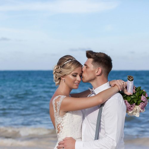 Portrait of bride and groom after wedding at Royalton Riviera Cancun