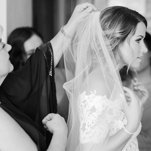 Bride having her veil put on at NOW Jade Cancun wedding