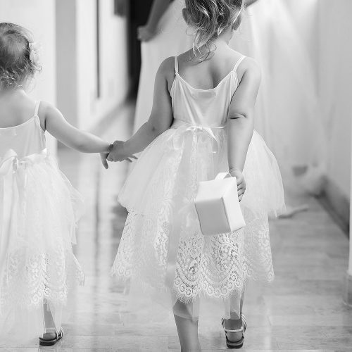 Flower girls walking before wedding at NOW Jade Cancun
