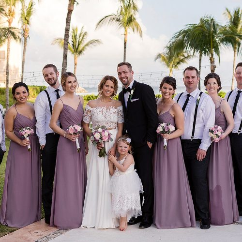 Bridal party portrait in garden at NOW Jade Cancun resort