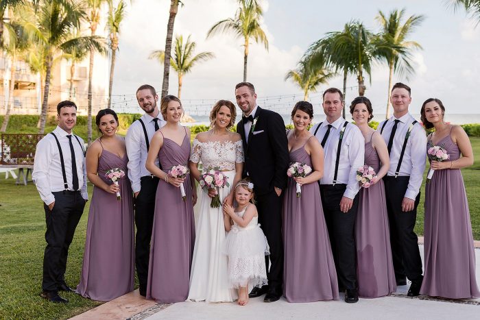 Bridal party portrait in garden at NOW Jade Cancun resort