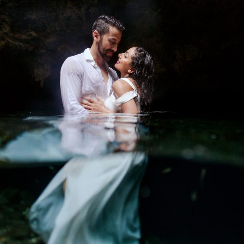 Bride and groom in water at TTD in Mexico