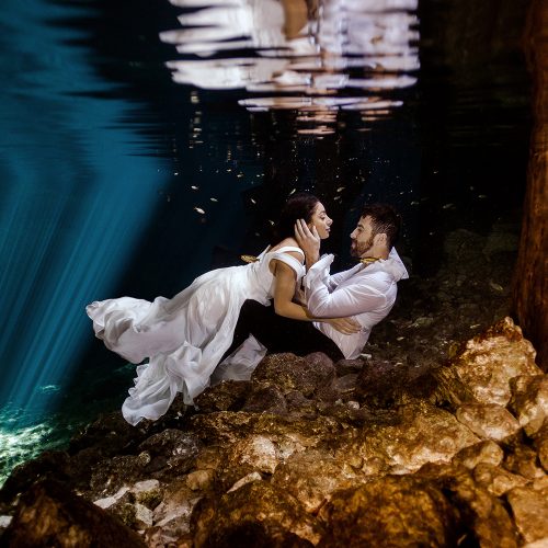 Cenote TTD in Mexico with bride and groom.