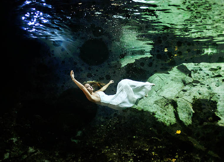 Woman in the Water for a Trash the Dress Featured Image