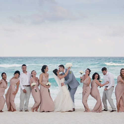 Bridal party on beach in Cancun