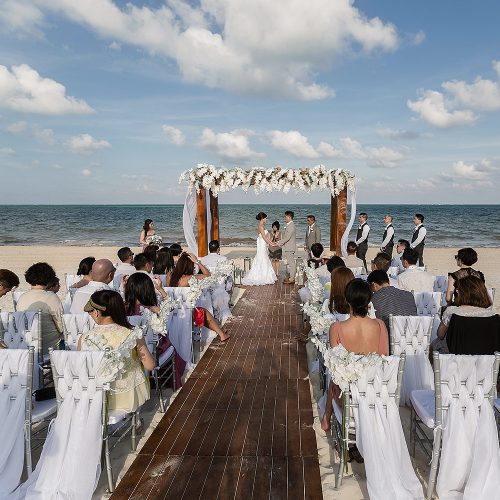 Wedding ceremony on beach at Moon Palace Cancun