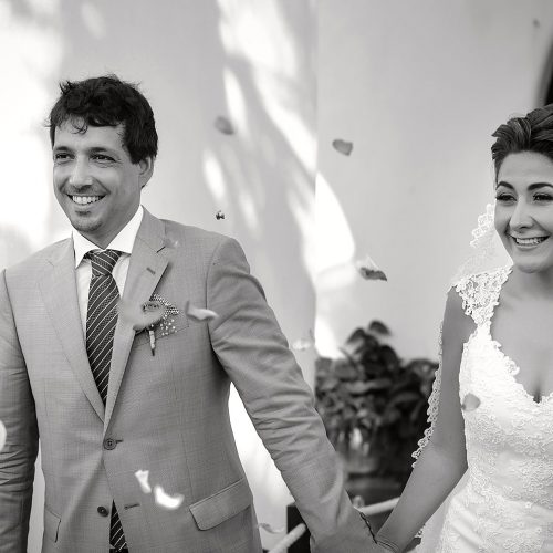 Bride and groom walking after wedding ceremony in Riviera Maya