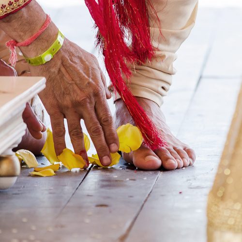 Close up of the grooms feet during Indian Wedding ceremony