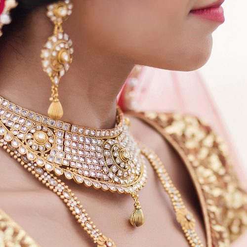 Close up of brides necklace and jewlery.