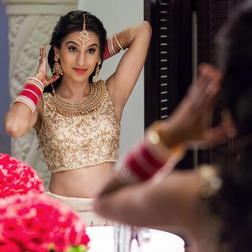 Indian bride getting ready for wedding reception