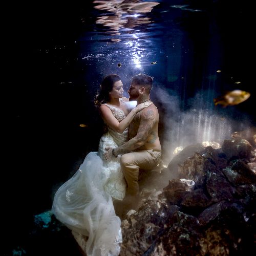 Bride and Groom underwater in Cenote Trash the Dress in Mexico