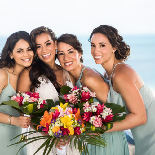Close up of bride with bridesmaids.