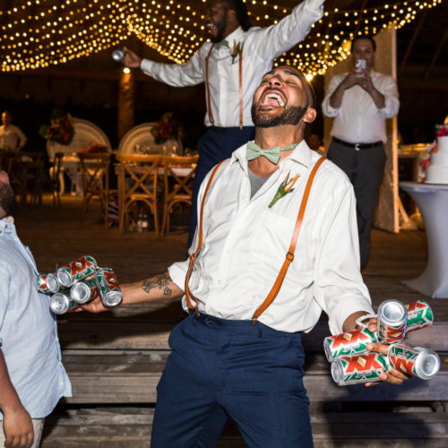 Guests dancing at wedding reception.