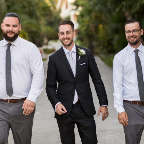 Groomsmen walking at NOW Sapphire Riviera Maya Resort