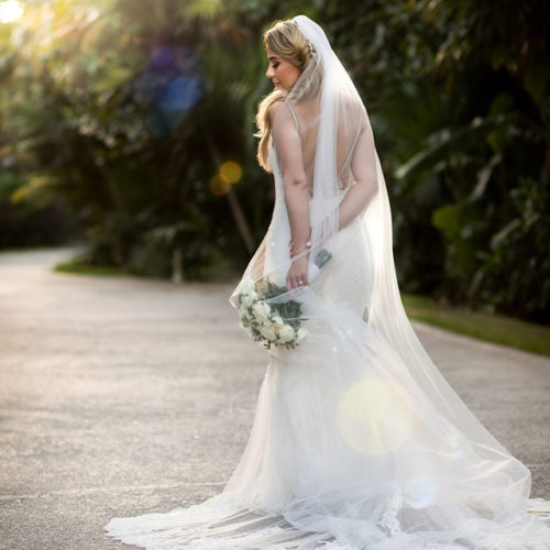 Bride in gardens at NOW Sapphire Riviera Maya Resort