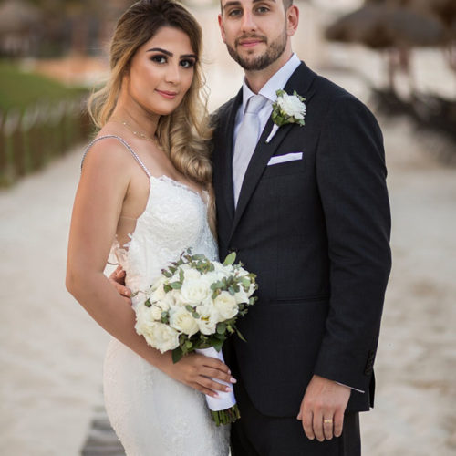 Portrait of bride and groom at Bride in gardens at NOW Sapphire Riviera Maya Resort