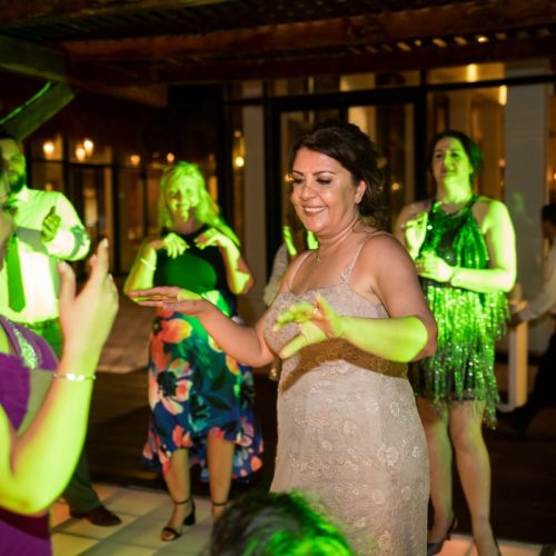 Guests dancing on tequila terrace, Bride in gardens at NOW Sapphire Riviera Maya Resort