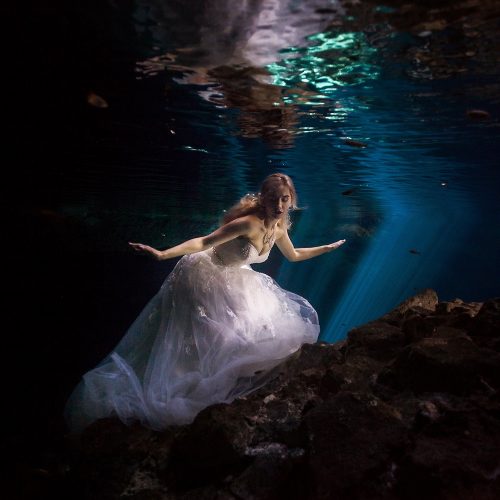 Bride underwater in Cenote Trash the Dress, Mexico