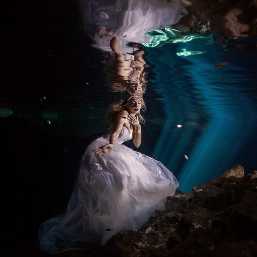 Bride underwater in Cenote Trash the Dress, Mexico