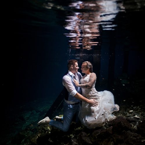 Bride and Groom underwater in Mayan Cenote Trash the Dress