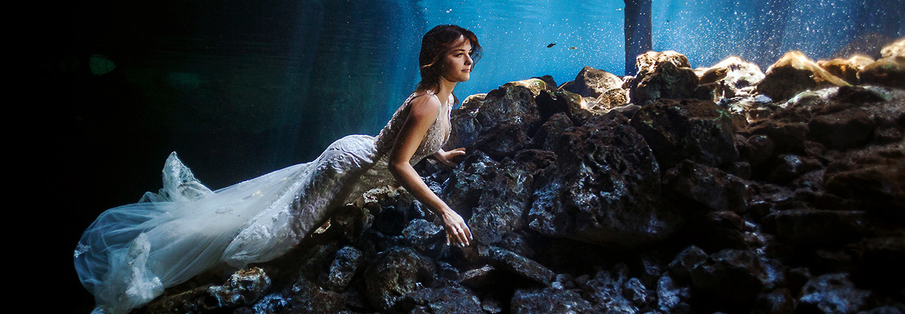 Bride underwater in Mayan Cenote Trash the Dress
