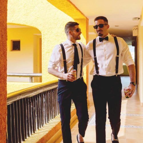 Groom walking with groomsmen at iberostar paraiso beach resort