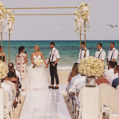Beautiful beach wedding ceremony at iberostar paraiso beach resort
