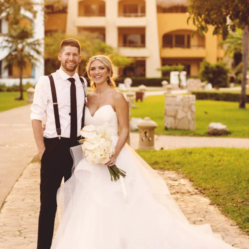 Portrait of bride and groom in gardens at iberostar paraiso beach resort