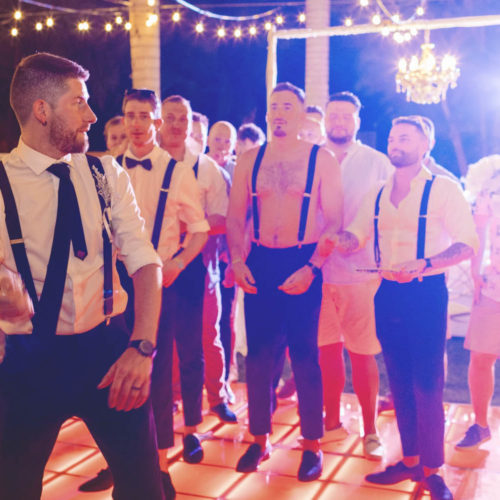 Catching the garter at wedding reception.