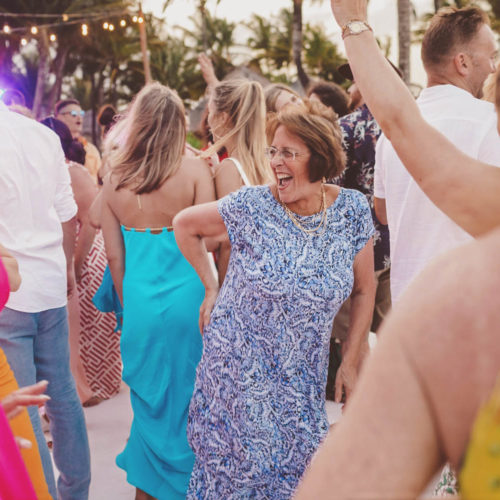 Older lady dancing at wedding reception