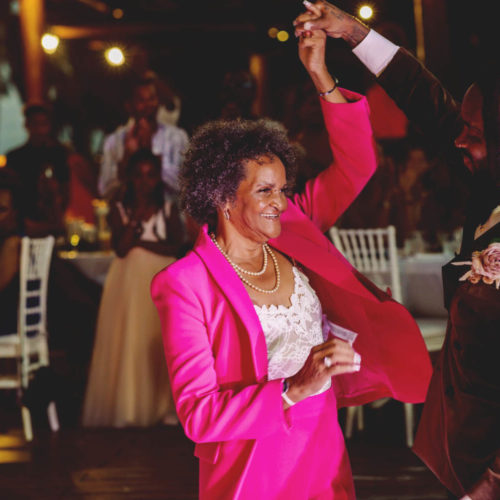 Mother of the groom dancing at wedding reception