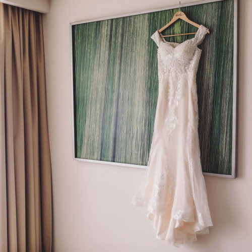Wedding dress hanging in room at Royalton Riviera Cancun
