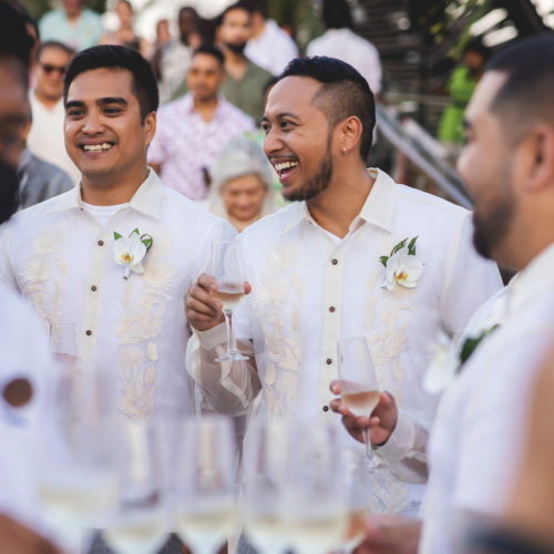 Guests laughing after wedding ceremony