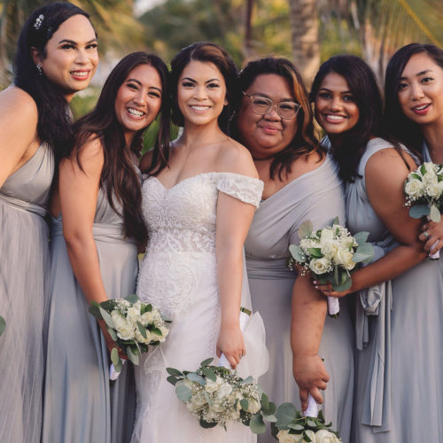 Bride with bridesmaids in garden at Royalton Riviera Cancun