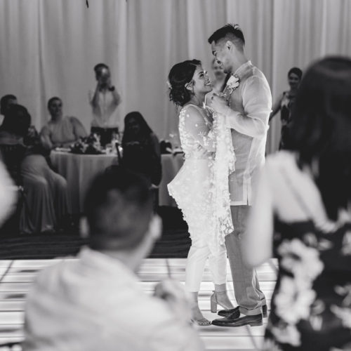 Bride and groom dancing at first dance in ballroom at Royalton Riviera Cancun